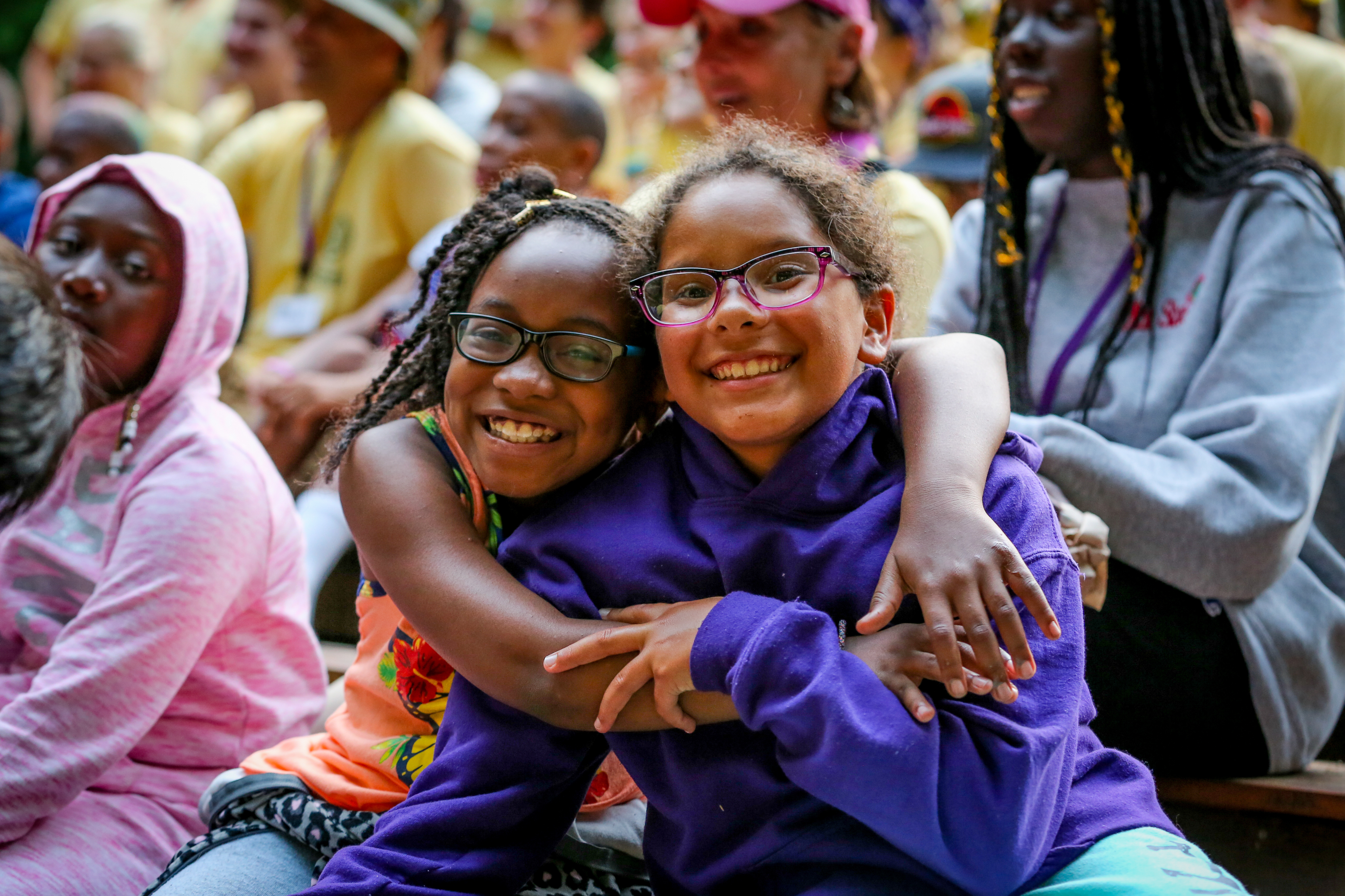 two girls hugging at Camp